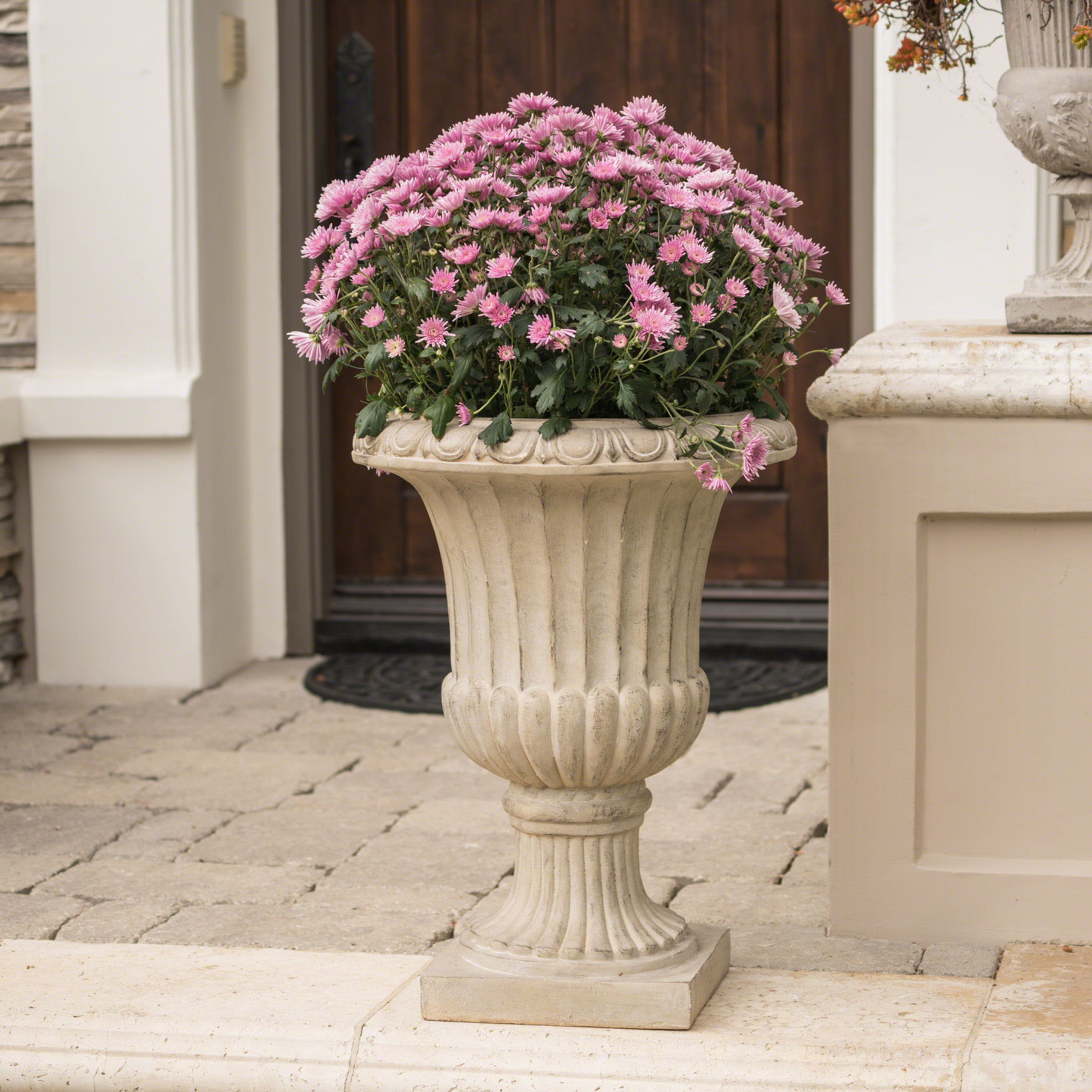 Fleur De Lis Living Rigoberto Composite Urn Planter | Wayfair
