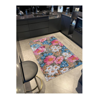 Tapis bleu tissé à motif floral lavable à la machine