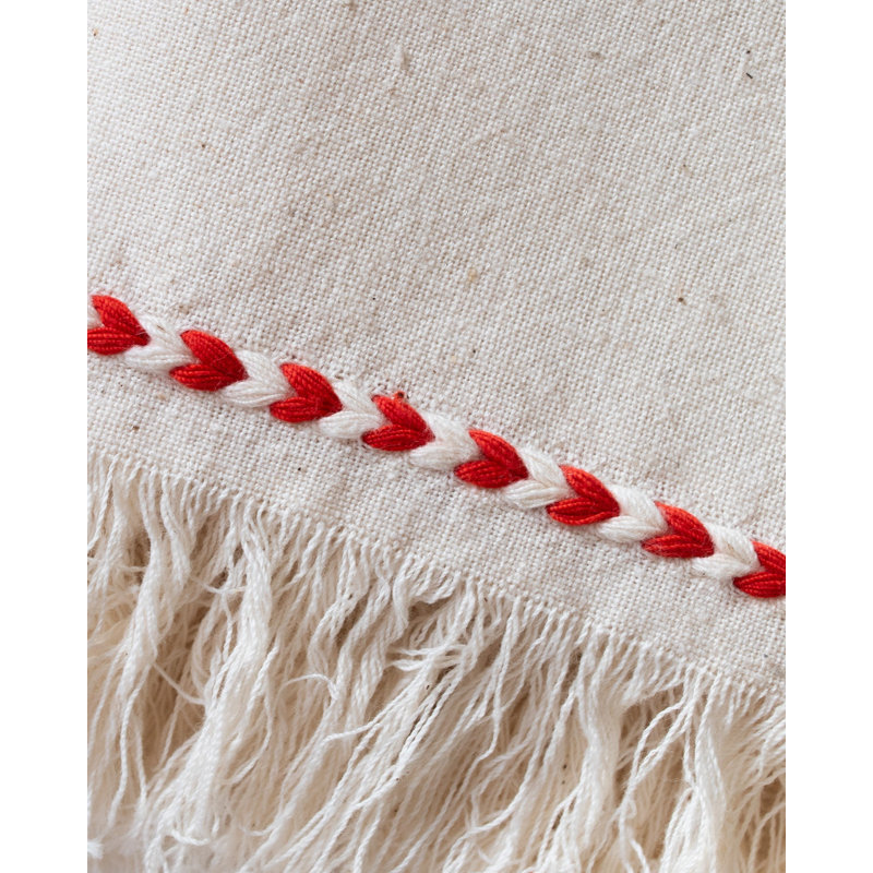 Serviette rouge tressée