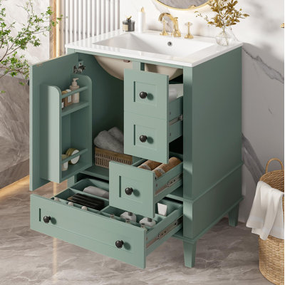 24-Inch Light Green Bathroom Vanity With An Integrated Ceramic Basin, Featuring A Door-Mounted Double-Layer Shelf, Soft-Close Drawers, And A Soft-Close Cabinet Door