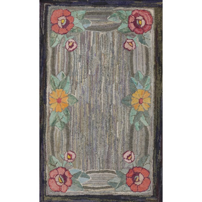 Tapis à motif floral abstrait gris