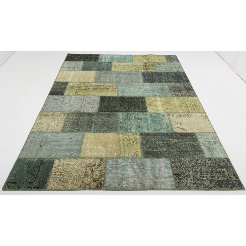 Tapis vert en coton noué à la main