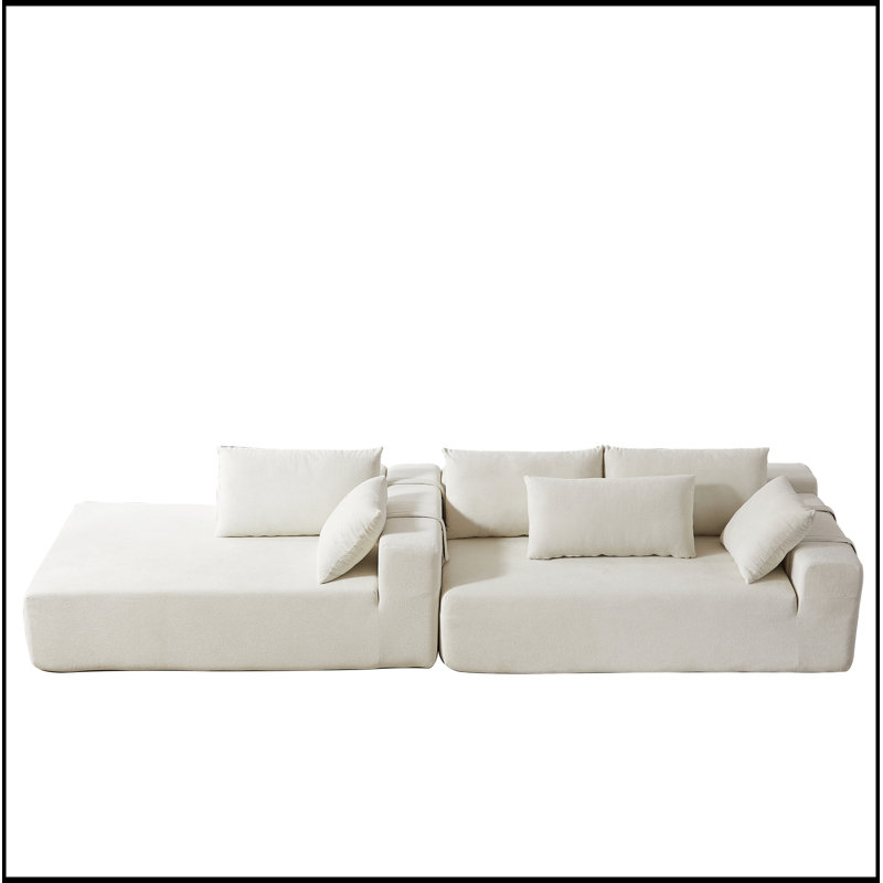 Ensemble de canapé modulaire rembourré en chenille luxueux, parfait pour le confort et les agencements personnalisables dans n'importe quel salon.