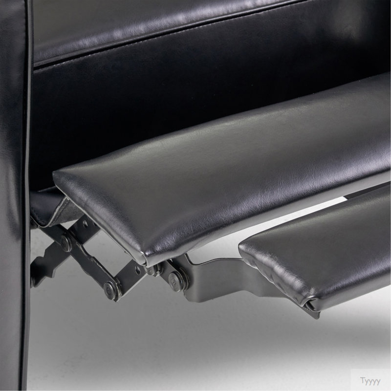 Fauteuil à dossier poussoir en cuir noir pour une décoration intérieure élégante