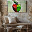 Toile Une pomme stylisée vibrante illustrée dans un style cubiste mettant en vedette une composition géométrique avec des sections distinctes-1316662860