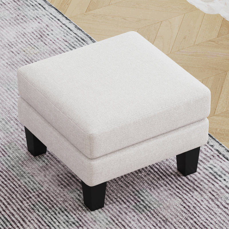 Repose-pieds en tissu beige