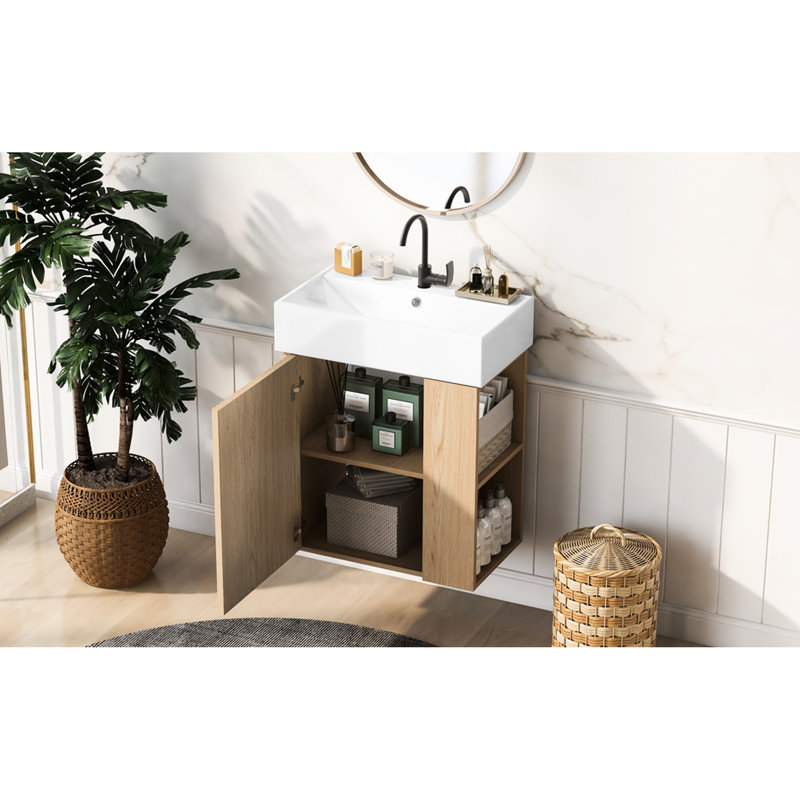 Meuble-lavabo mural moderne de 21,6 po avec poignée en or rose, fixation pour robinet à un trou, rangement latéral pour les petites salles de bain, porte ondulée, articles de toilette et design élégant