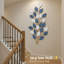 Art mural vertical vert et feuille blanche
