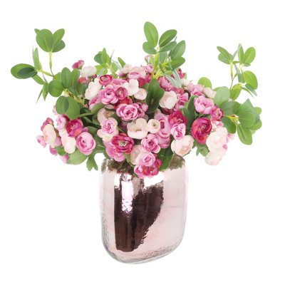 Arrangement de renoncule dans un vase en verre mercurisé