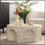 Table basse moderne et minimaliste moderne avec base découpée arquée unique pour le salon et la chambre à coucher