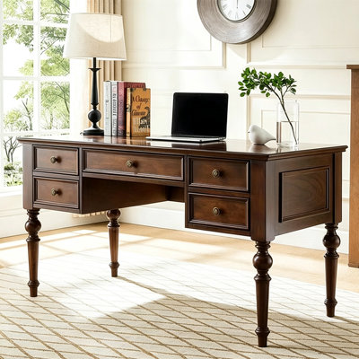 Bureau vintage en bois massif avec plusieurs tiroirs de rangement