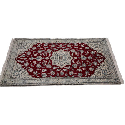 Nishtha Oriental Area Rug in Red