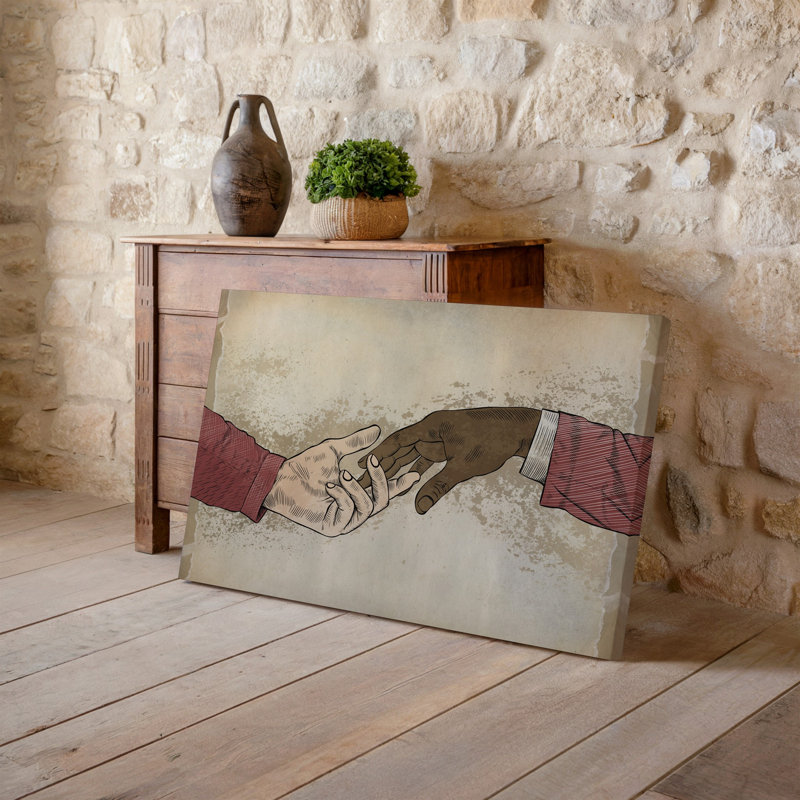 Toile sur fond de style rétro texturé dans des tons de beige chaud avec art mural Un effet de papier subtil vieilli avec deux mains sur toile