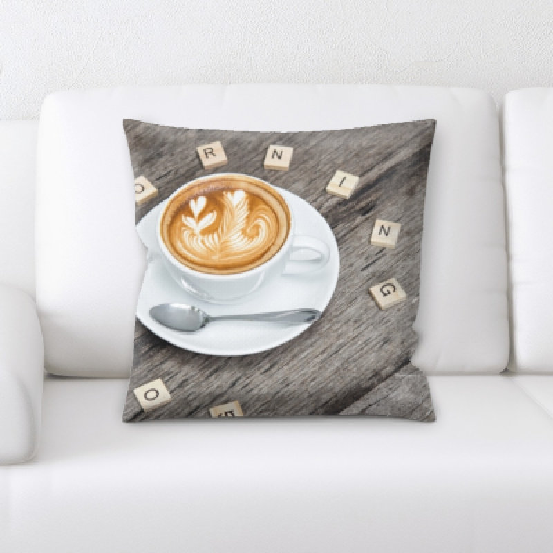 Coussin décoratif bensley café sur table