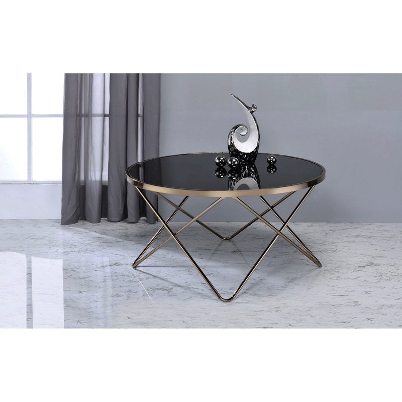 Table basse décorative moderne en verre noir et champagne