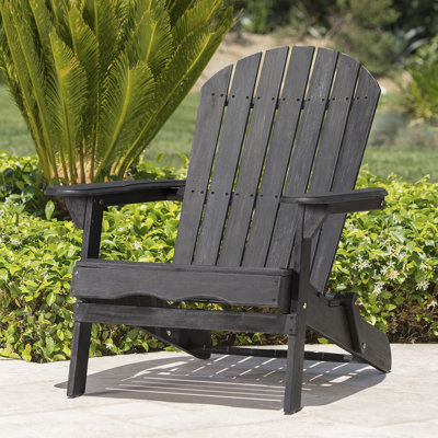 Chaise Adirondack en bois d'acacia, conception pliable et lattes traditionnelles pour le confort et la durabilité à l'extérieur