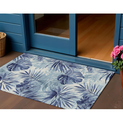 Tapis intérieur/extérieur lavable à motifs floraux bleus et ivoire 90 x 150 cm