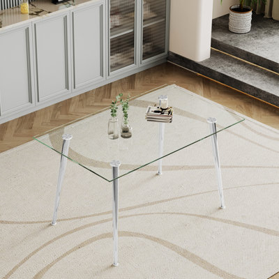 Table de salle à manger de 0,32 po d'épaisseur avec plateau en verre trempé avec pieds en acier inoxydable argenté, design élégant et simple à utiliser pour tout espace, verre facile à essuyer, métal stable et non rouillé