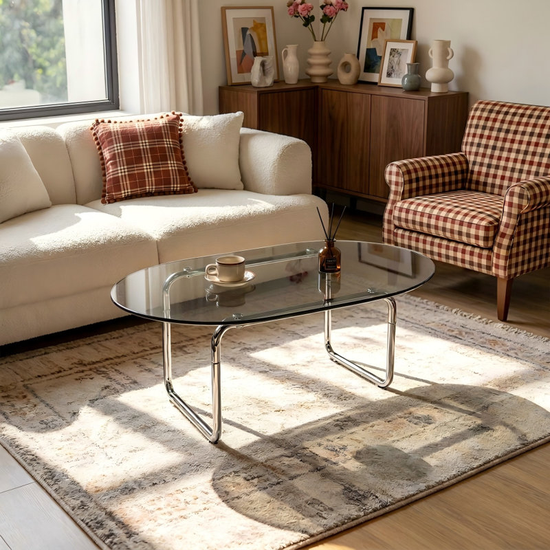 Table basse incurvée en verre trempé avec plateau teinté gris et pattes en métal chromé poli, table d'appoint contemporaine pour salon