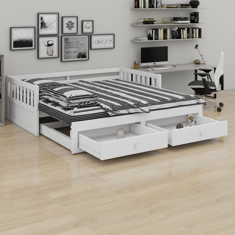 Le lit de jour avec lit gigogne et tiroirs intégrés offre une conception extensible pour les chambres d'amis et les espaces partagés.