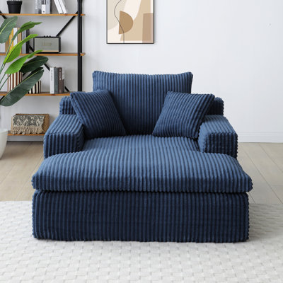 Chaise longue orange de 64 po x 46 po, très grand lit rembourré avec fausse fourrure de couleur nuage, conception ergonomique confortable et support d'accoudoirs, système de ressorts ensachés, stable pour une longue durée de vie