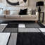 Tapis gris / blanc / noir à motif géométrique Astika-21270882