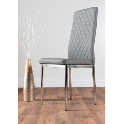 Tierra Modern Chrome Metal & Glass Round Dining Table Set with 6 Quilted Faux Leather Chairs