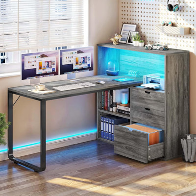 L-Shaped Computer Desk With Integrated Power Outlets, RGB LED Lighting, And File Cabinet, Featuring Ample Storage And Adjustable Shelves For Home Office Workspace