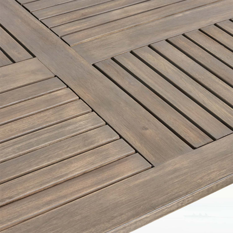 Élégante table de salle à manger ovale en bois d'acacia de 70 pouces avec des pieds lisses et une finition en teck pour une utilisation extérieure