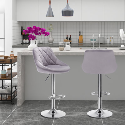 Dequawn Swivel Upholstered Adjustable Height Counter Stool with Metal Frame