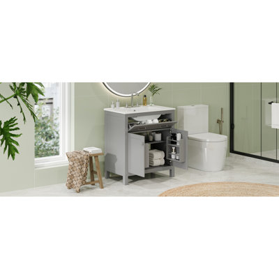 Meuble-lavabo de 30 po avec lavabo en céramique. Armoire moderne grise. 2 portes, tablette et tiroir. Fermeture en douceur. Améliore la fonction des tablettes des portes. Conforme au décor contemporain