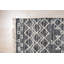 Tapis noir en laine à motif géométrique fait à la main Kilim-244802970