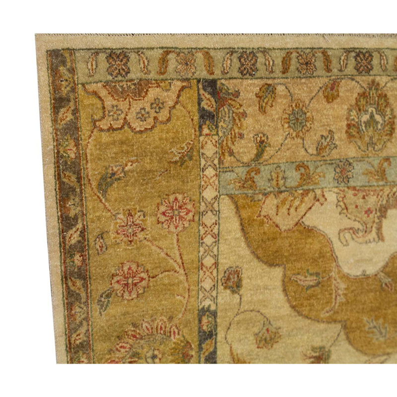 Tapis jaune / brun noué à la main