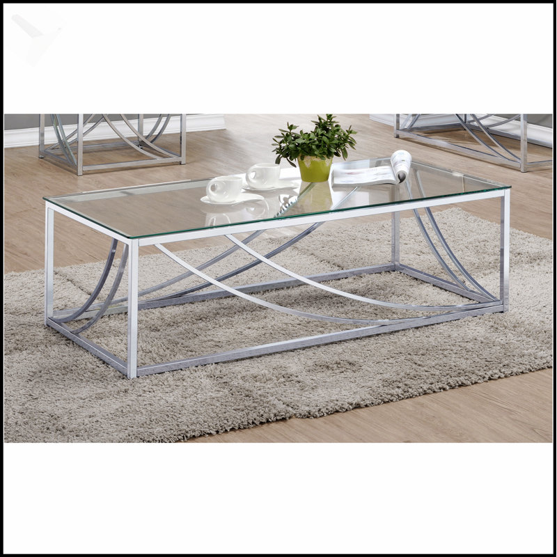 Table basse en verre et chrome Brianne avec pieds en métal durables, parfait pour les intérieurs modernes et minimalistes.