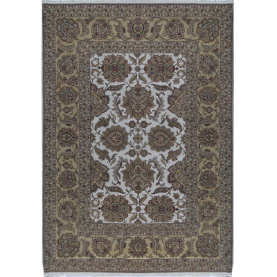 Tapis ivoire et doré de haute qualité noué à la main