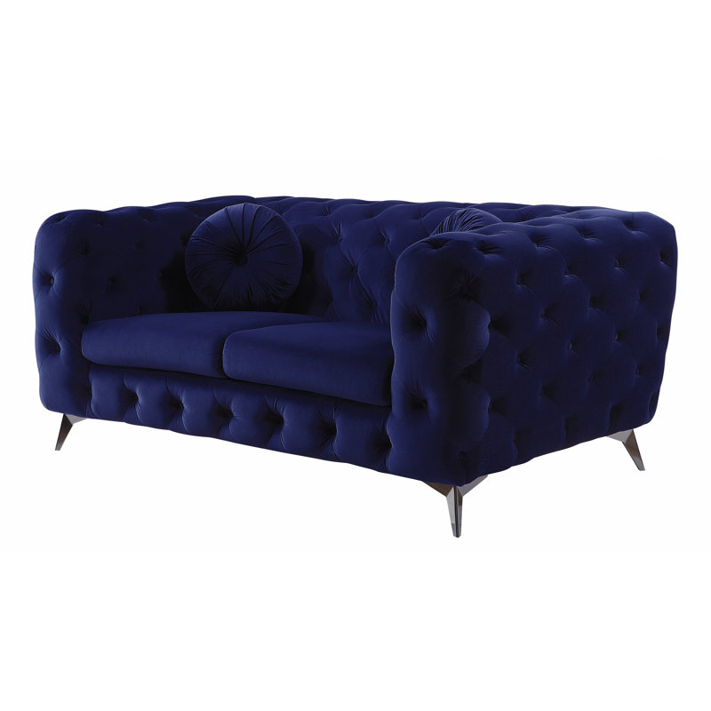 Causeuse en velours bleu