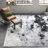 Tapis gris / noir en polypropylène tissé à la machine à motif abstrait Leonaldo