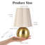 Petite lampe de table avec base en laiton doré et abat-jour en lin festonné