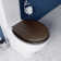 Croydex Montoro Flexi-Fix Soft Close Wooden Toilet Seat - Quick Release Button for Easy Cleaning and Adjustable Hinges with Top and Bottom Fixings, Antibacterial Heavy Duty Toilet Seat (Walnut Effect)