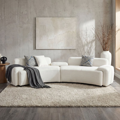 Modern Upholstered Curved Sectional Sofa with Damask Accent Pillows