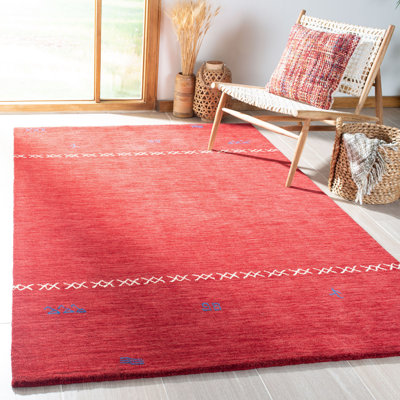 Tapis rouge en laine fait à la main Santiago
