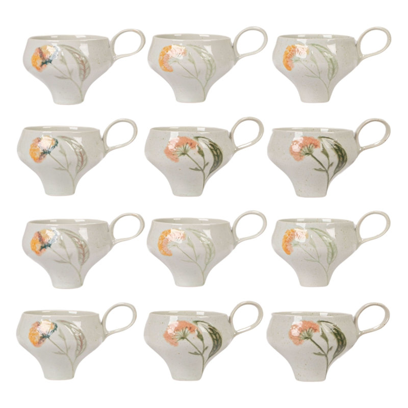 Tasses en grès peintes à la main avec motifs floraux dans un glacis réactif
