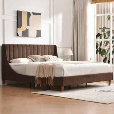 Linvel Upholstered Wingback Platform Bed
