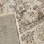 Tapis beige à motif abstrait Evanoff-23511097
