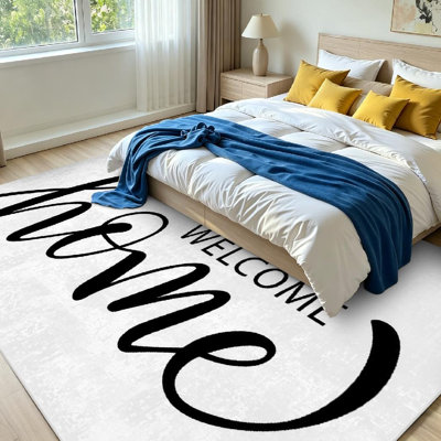 Tapis d'intérieur noir à motif de pinceau dessiné et brossé Welcome Home