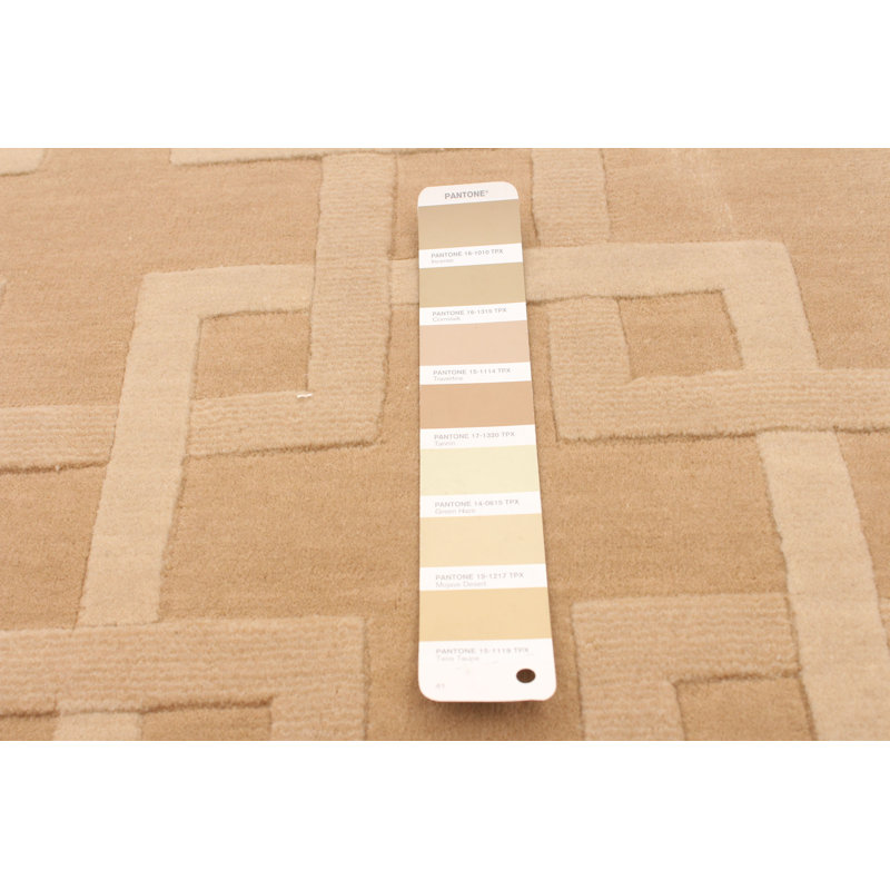 Tapis beige en laine à motif abstrait Cayslee