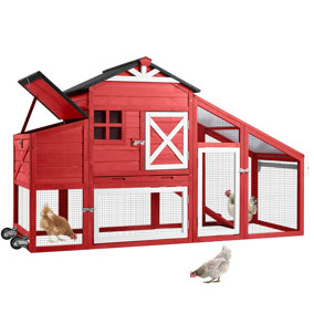 Red and white backyard storage shed with window. 