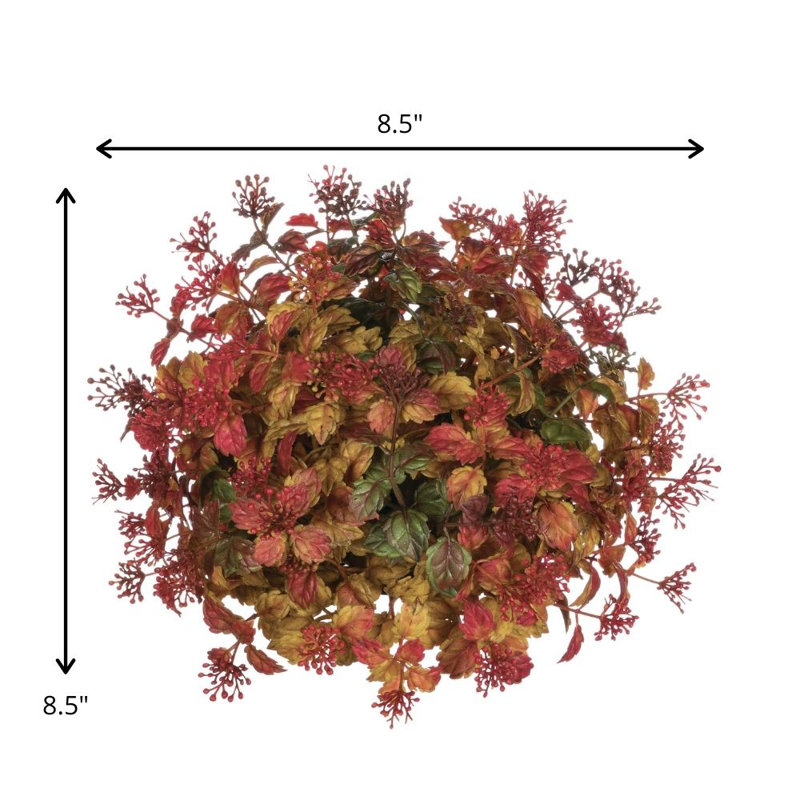 Centre de table à feuilles et baies