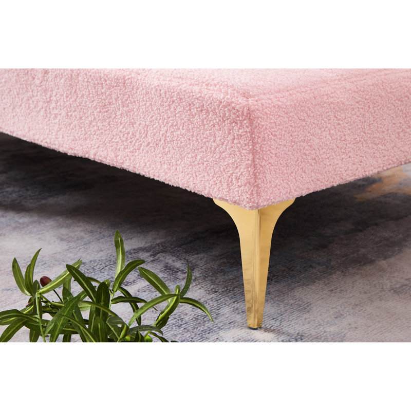 Futon convertible avec tissu rose et pieds en métal dorés - Confortable pour les petits espaces tout en polyvalence