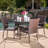 Donato 4 - Person Wicker Patio Dining Set with Round Table